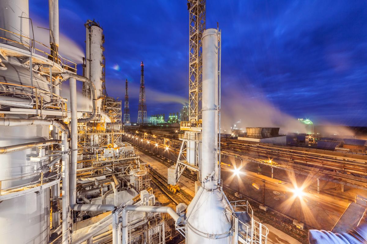 Chemical processing plant lit up at night
